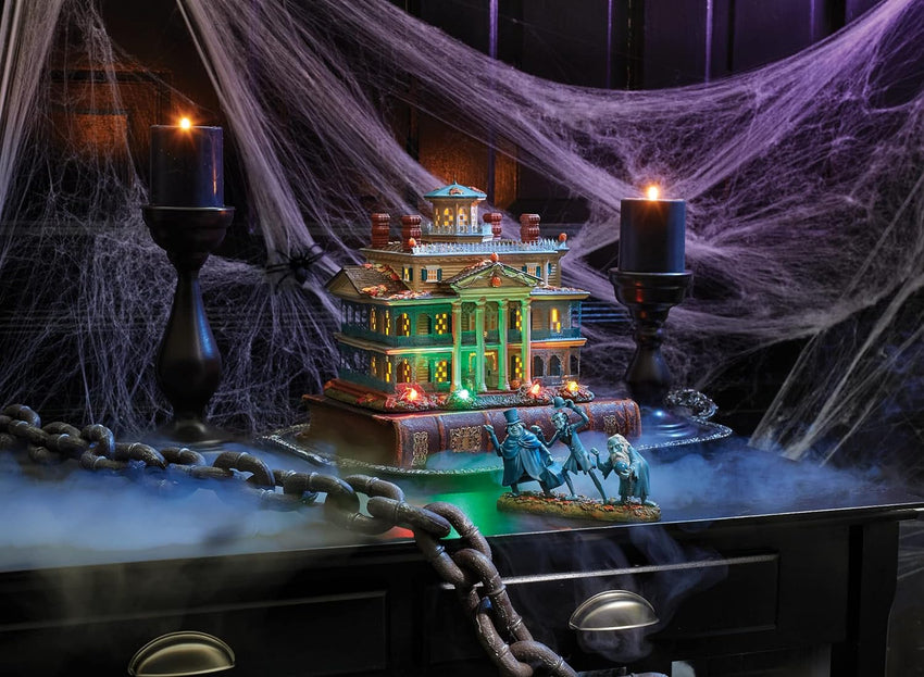 Department 56 Snow Village Halloween Disneyland Haunted Mansion Lit Building. 9.1 Inch. Multicolor