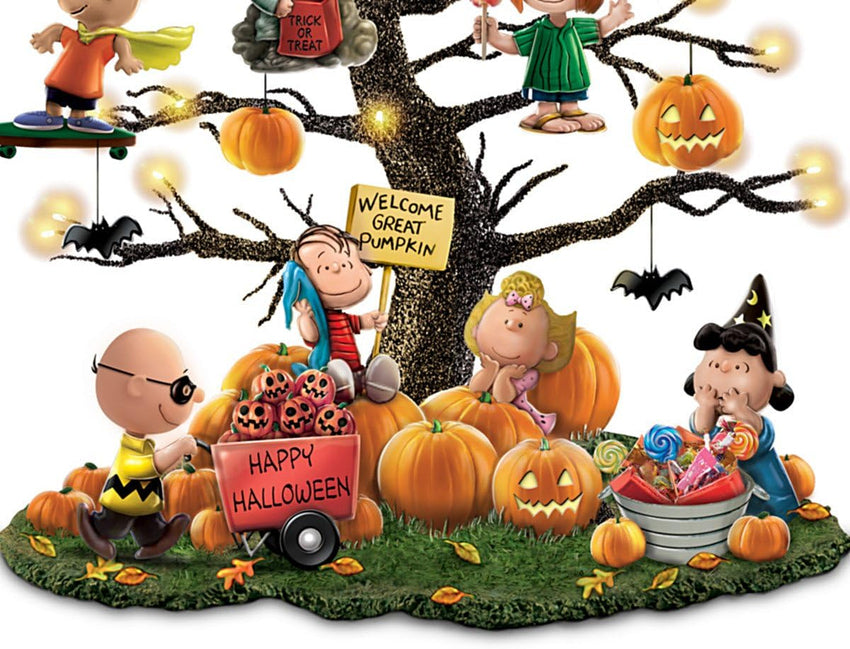Pumpkin lights up Halloween tabletop tree